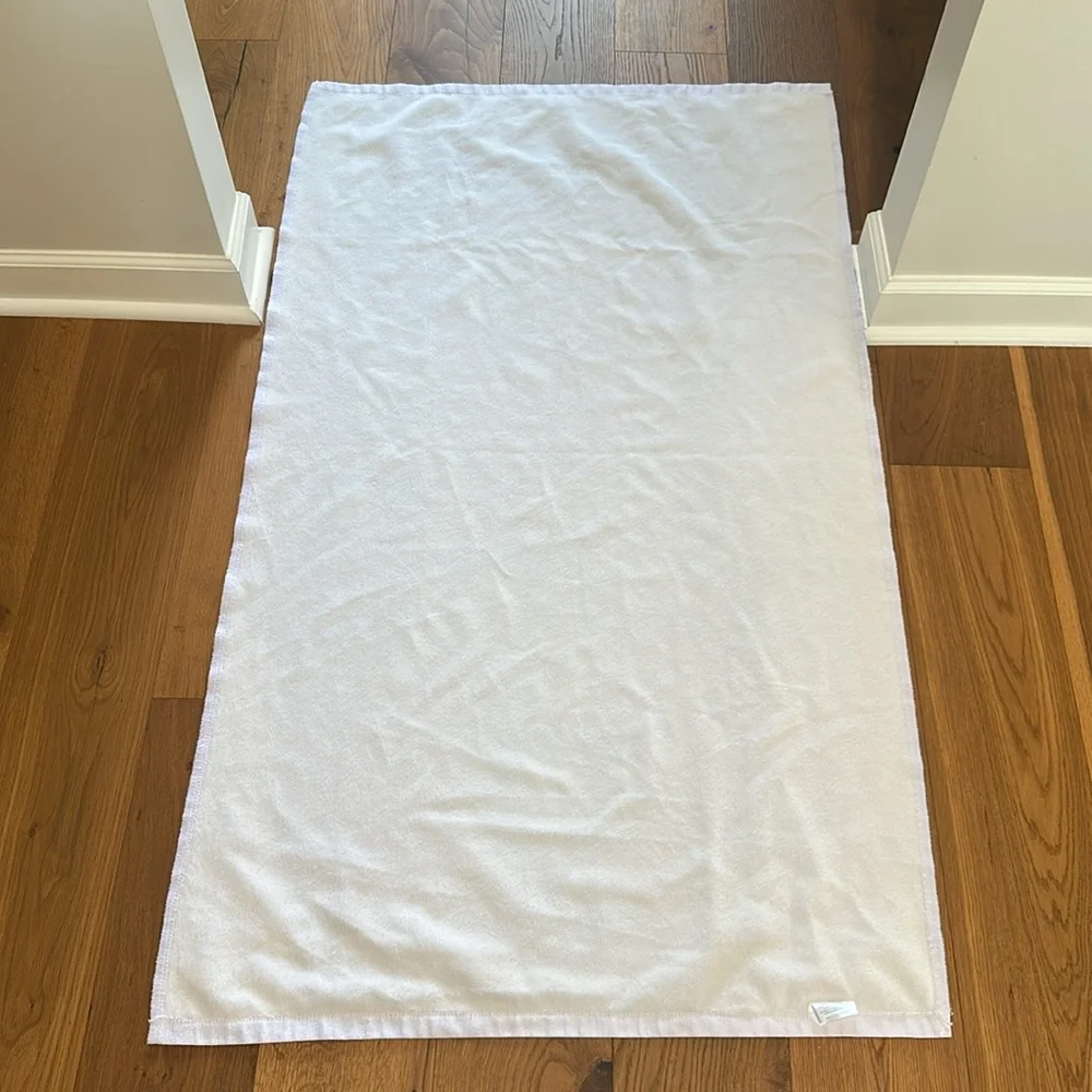 Blue and white beach towel. Used once. Like new.